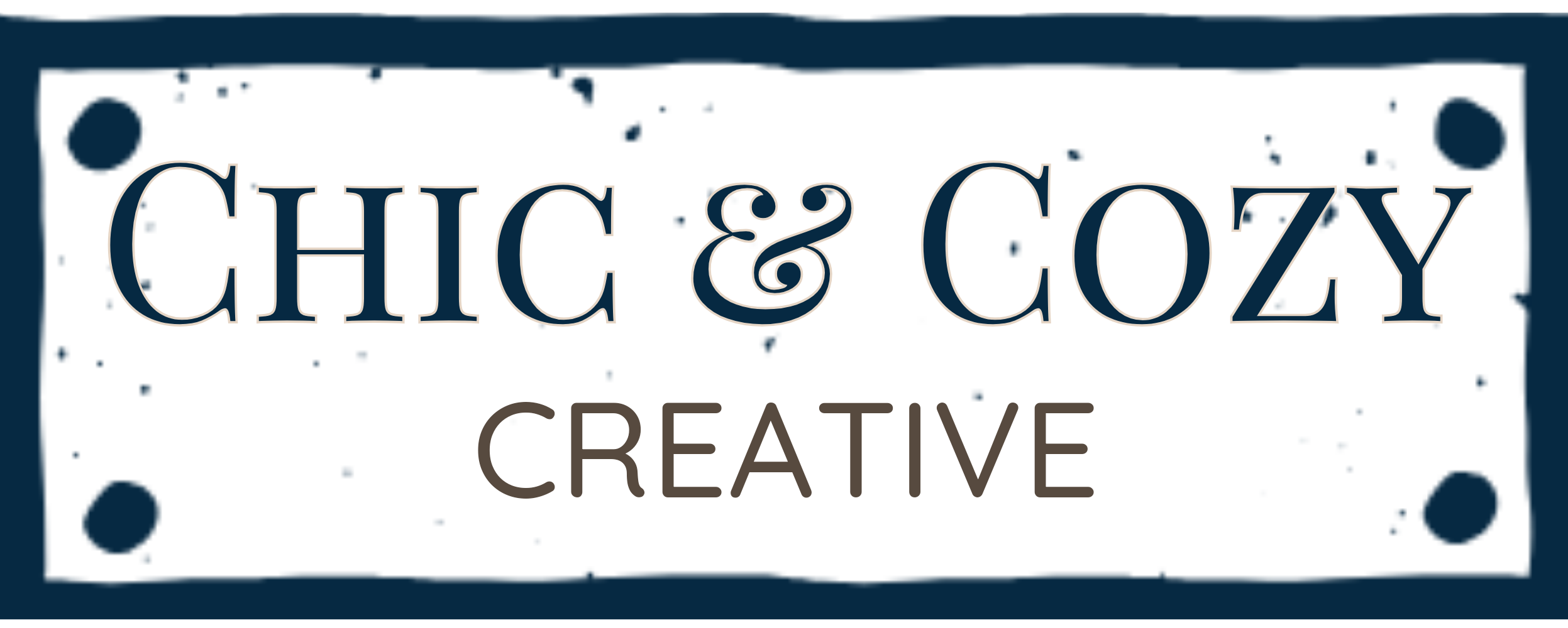 white speckled store sign with a navy blue border with words Chic & Cozy Creative